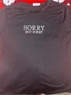 Free Kisses Black Tee with 'SORRY NOT SORRY' White Chest Graphic